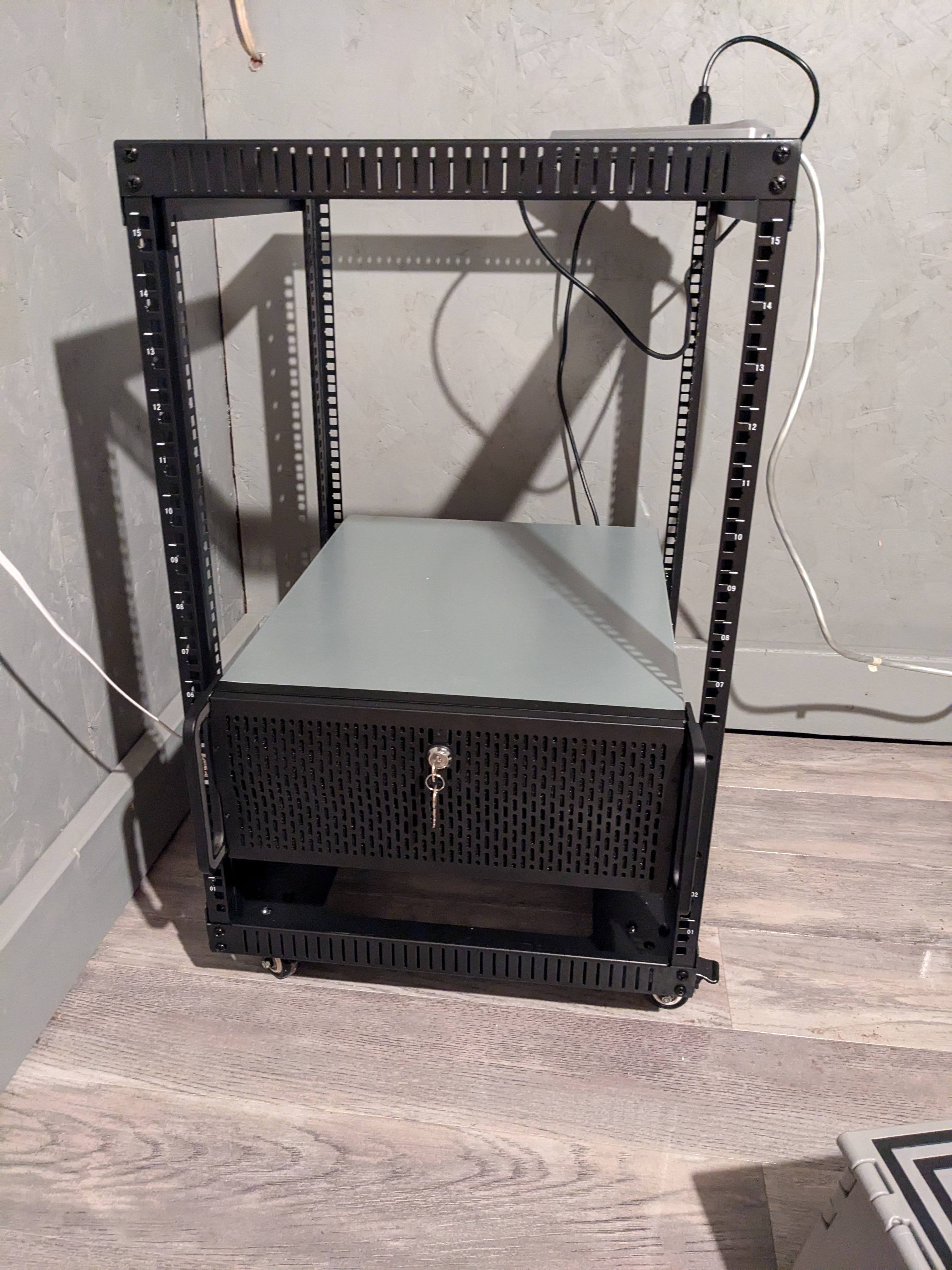 Image of a server rack with an installed chassis wired up